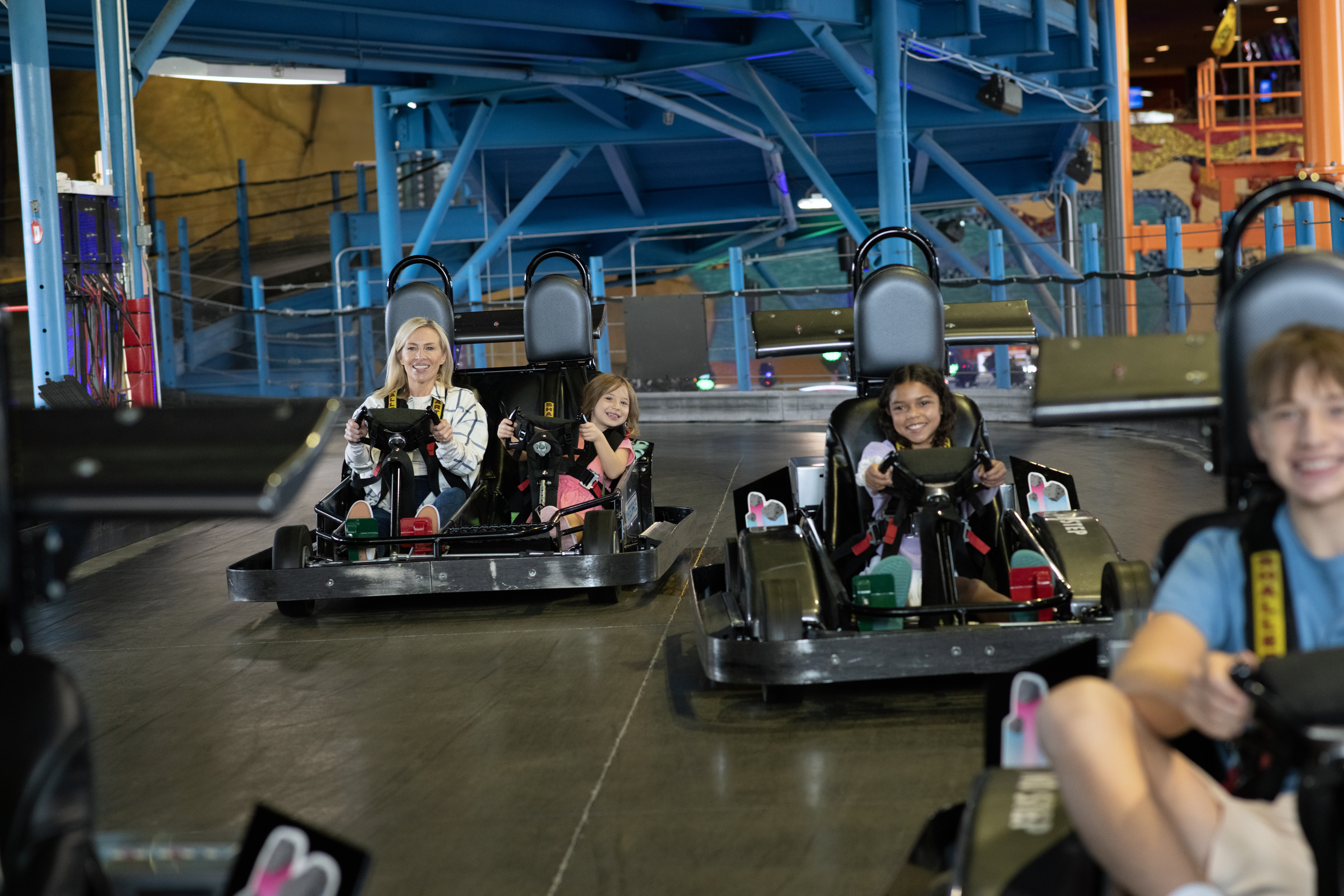 People driving go karts